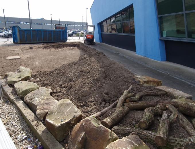 The bog garden completely flat and ready for the soil delivery.