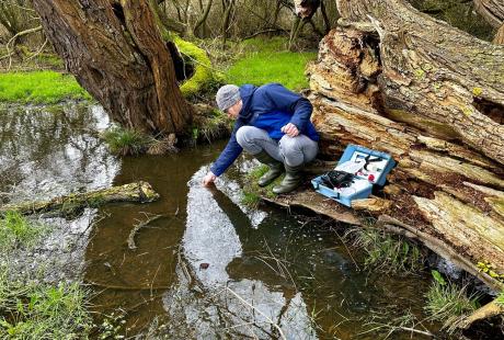 One of The Deep's Aquarists testing water samples at Lincolnshire's blow well sites.