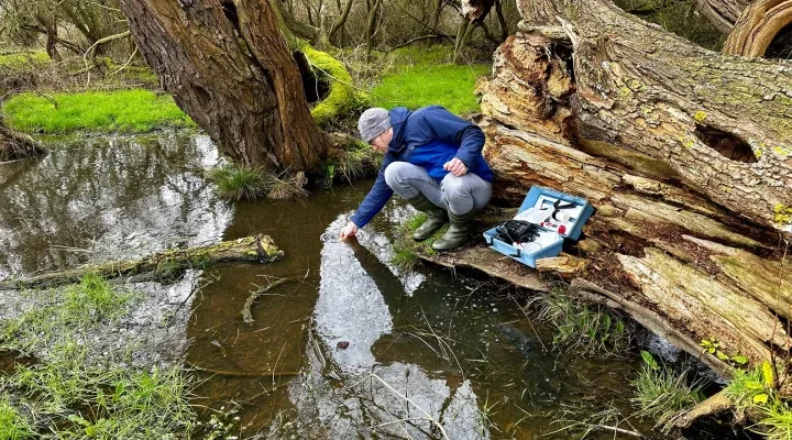 One of The Deep's Aquarists testing water samples at Lincolnshire's blow well sites.