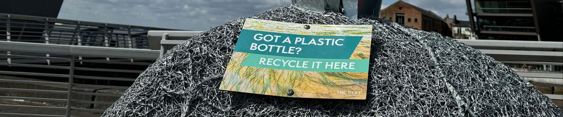 Seagrass Sculpture and recycling station outside The Deep building