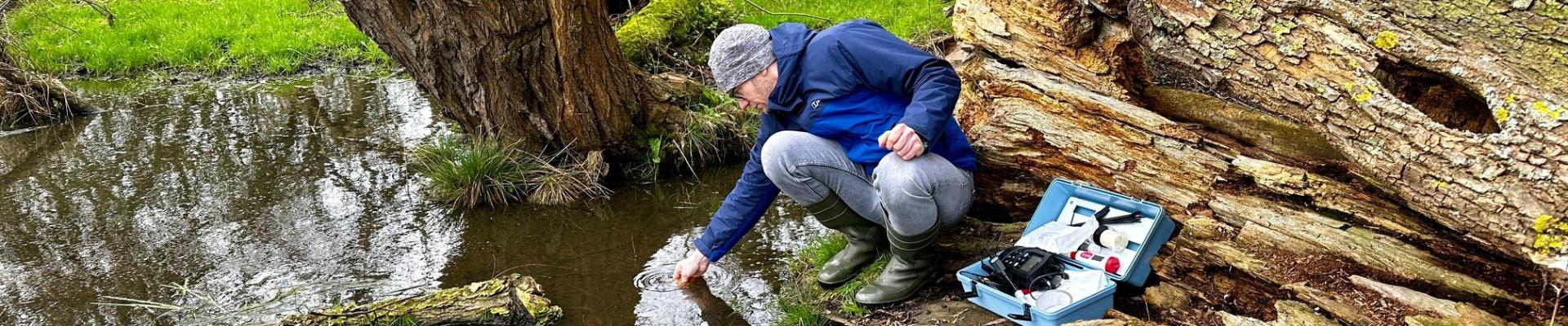 One of The Deep's Aquarists testing water samples at Lincolnshire's blow well sites.