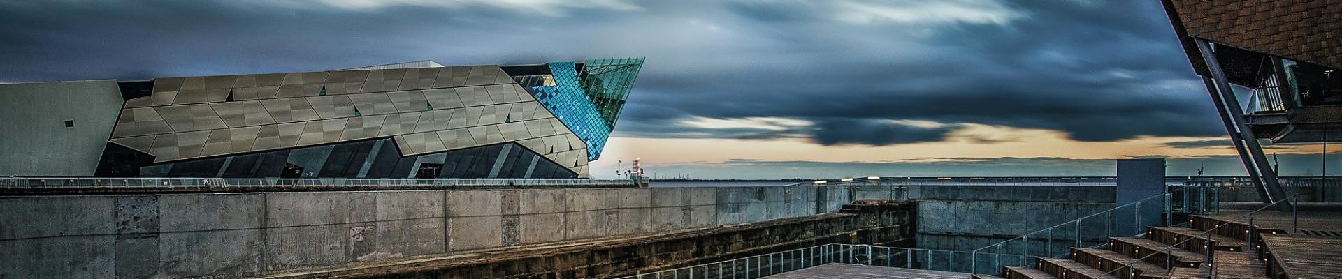 The Deep building at dusk.